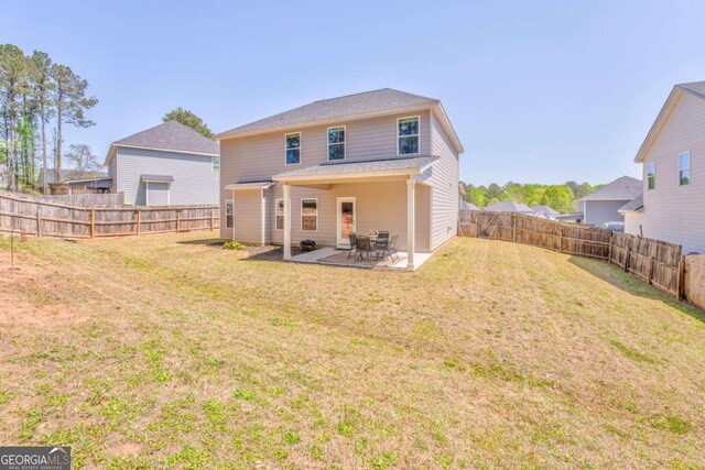1302 Gardenia Ct, Villa Rica, GA 30180 - rear view of house featuring a patio area, a fenced backyard, and a lawn