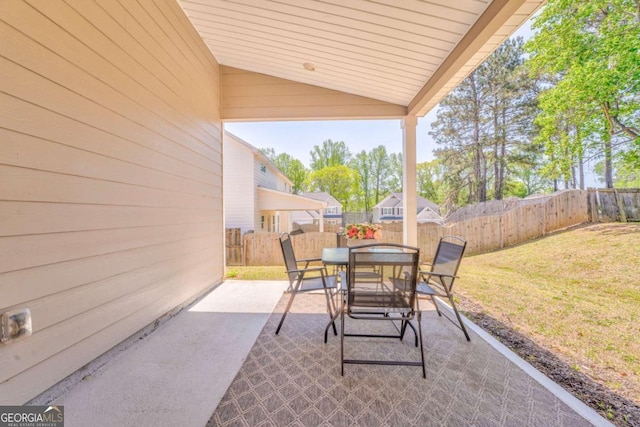 1302 Gardenia Ct, Villa Rica, GA 30180 - view of patio featuring a fenced backyard and outdoor dining area