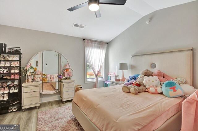 196 Saddleridge Trl, Senoia, GA 30276 - bedroom with visible vents, wood finished floors, a ceiling fan, and lofted ceiling
