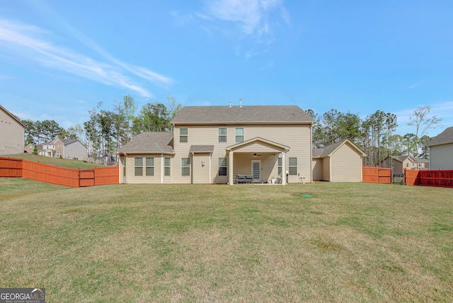 196 Saddleridge Trl, Senoia, GA 30276 - rear view of property featuring fence and a lawn