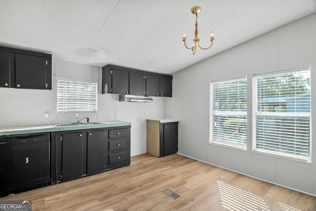 6603 Christie Cir, Blackshear, GA 31516 - kitchen featuring black dishwasher, a sink, dark cabinets, vaulted ceiling, and light wood-type flooring