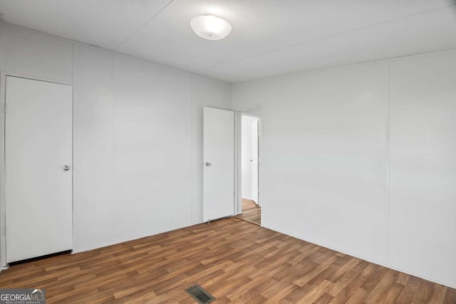 6603 Christie Cir, Blackshear, GA 31516 - unfurnished bedroom featuring wood finished floors