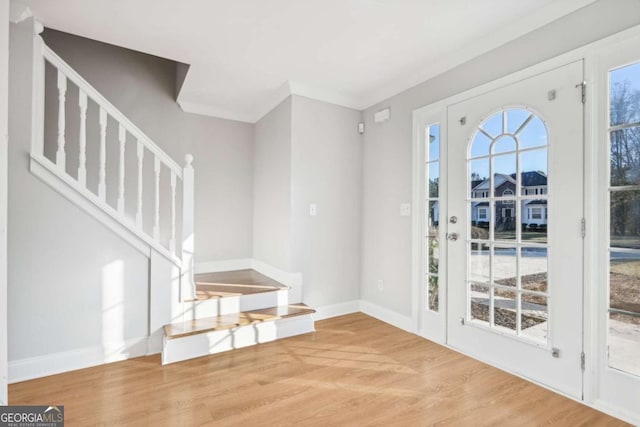 277 Edison Dr, Stockbridge, GA 30281 - doorway featuring wood finished floors, stairs, and baseboards