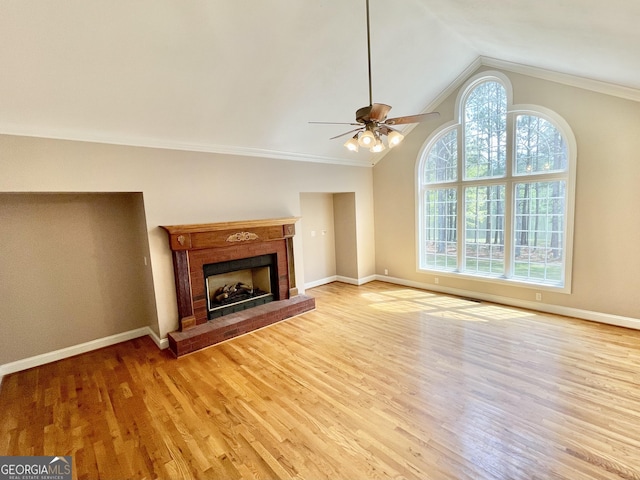 293 N Avery Rd NW, Rome, GA 30165 - unfurnished living room with light wood finished floors, baseboards, a ceiling fan, and a brick fireplace