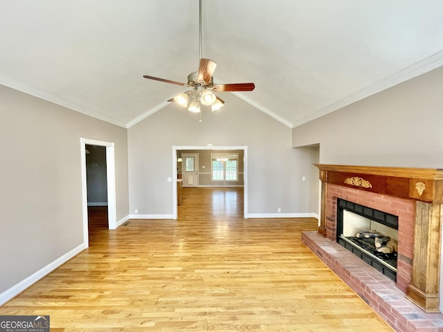 293 N Avery Rd NW, Rome, GA 30165 - unfurnished living room featuring a ceiling fan, baseboards, light wood-style flooring, and a brick fireplace