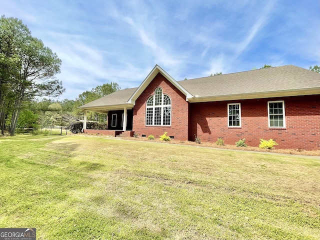 293 N Avery Rd NW, Rome, GA 30165 - rear view of house with a yard, a shingled roof, brick siding, and crawl space