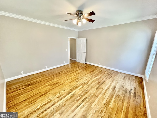 293 N Avery Rd NW, Rome, GA 30165 - unfurnished bedroom featuring baseboards, ceiling fan, light wood-style flooring, and crown molding