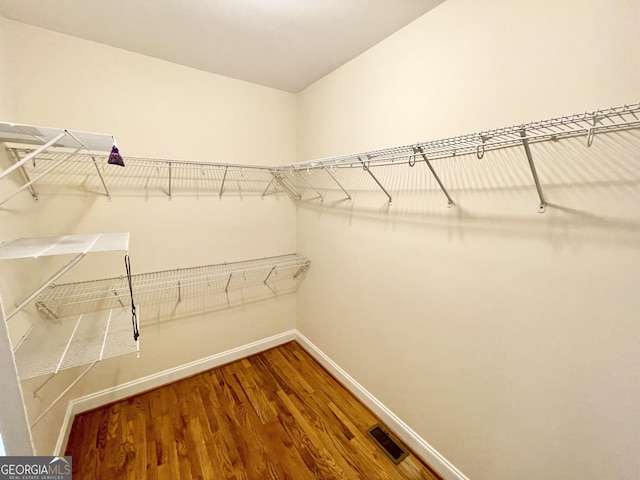 293 N Avery Rd NW, Rome, GA 30165 - spacious closet featuring visible vents and wood finished floors