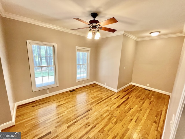 293 N Avery Rd NW, Rome, GA 30165 - empty room featuring light wood-style flooring, a ceiling fan, crown molding, visible vents, and baseboards