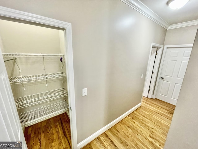 293 N Avery Rd NW, Rome, GA 30165 - hallway featuring baseboards, crown molding, and wood finished floors