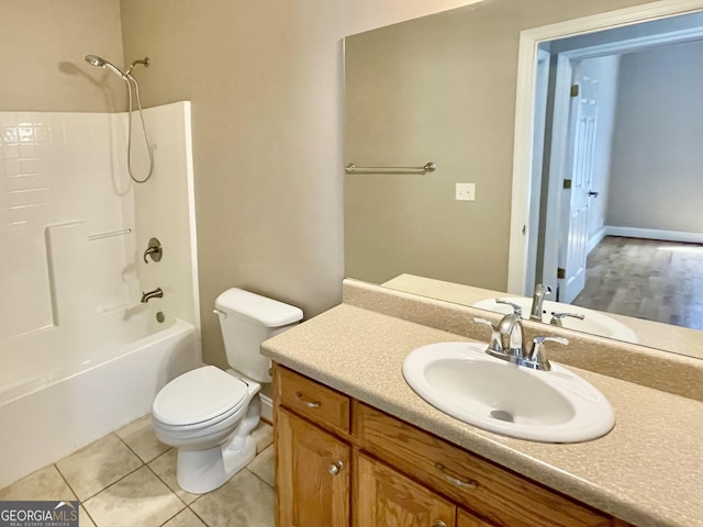 293 N Avery Rd NW, Rome, GA 30165 - bathroom featuring vanity, toilet, and washtub / shower combination