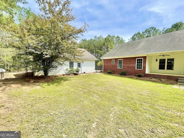 293 N Avery Rd NW, Rome, GA 30165 - view of yard featuring a ceiling fan and fence