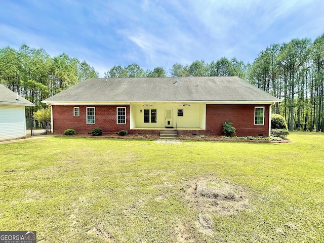 293 N Avery Rd NW, Rome, GA 30165 - rear view of property featuring a yard, brick siding, and ceiling fan