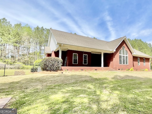 293 N Avery Rd NW, Rome, GA 30165 - view of side of home featuring a yard, fence, brick siding, and crawl space