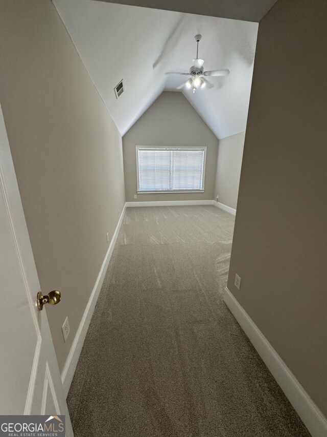 135 Danube Trl, Stockbridge, GA 30281 - bonus room featuring lofted ceiling, baseboards, visible vents, ceiling fan, and carpet