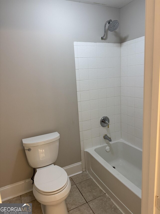 135 Danube Trl, Stockbridge, GA 30281 - full bath with toilet, tile patterned floors, shower / bathing tub combination, and baseboards