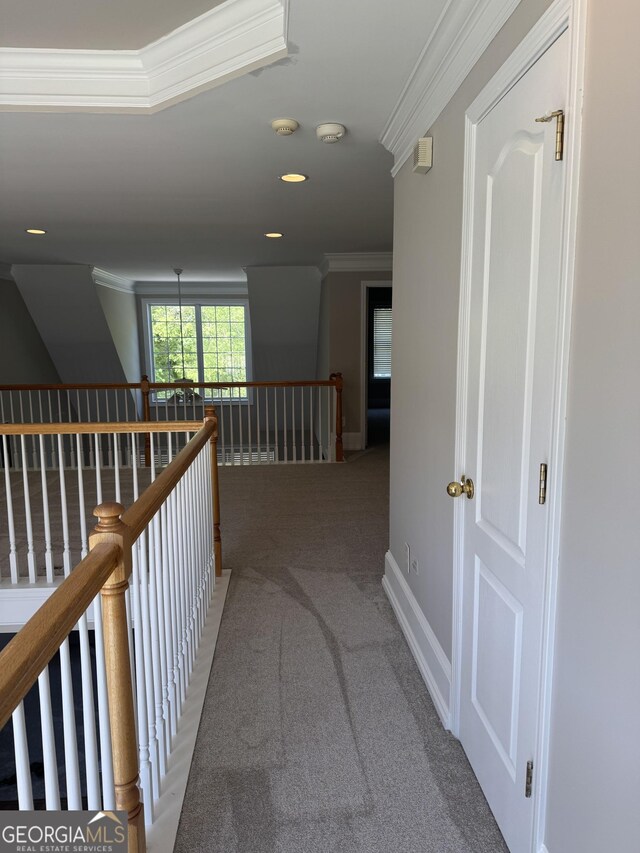 135 Danube Trl, Stockbridge, GA 30281 - corridor featuring baseboards, recessed lighting, an upstairs landing, crown molding, and carpet