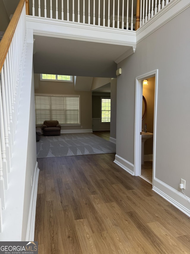 135 Danube Trl, Stockbridge, GA 30281 - interior space featuring crown molding, wood finished floors, and baseboards