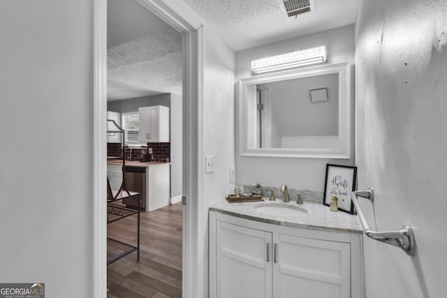 2998 Kenville Ln, Decatur, GA 30034 - bathroom with visible vents, a wealth of natural light, and a textured ceiling