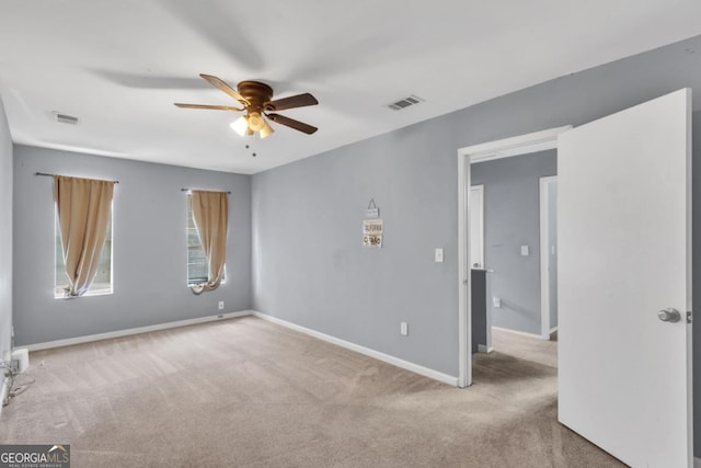 2998 Kenville Ln, Decatur, GA 30034 - unfurnished room with visible vents, baseboards, a ceiling fan, and carpet flooring
