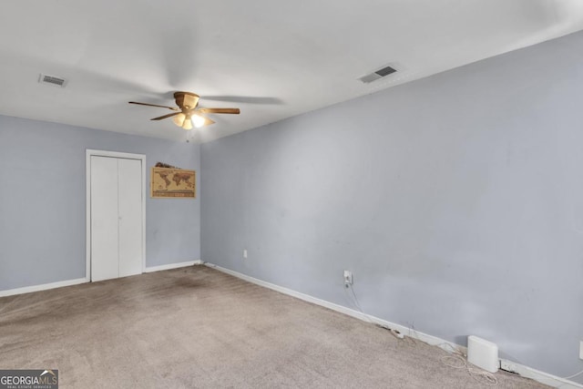 2998 Kenville Ln, Decatur, GA 30034 - carpeted empty room featuring visible vents, ceiling fan, and baseboards