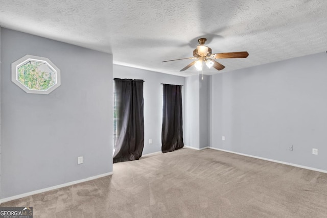 2998 Kenville Ln, Decatur, GA 30034 - carpeted empty room featuring a textured ceiling, ceiling fan, and baseboards