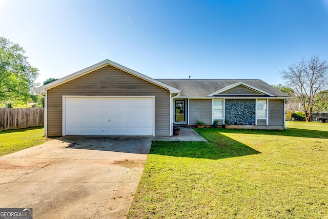 ranch-style house featuring a front yard, an attached garage, fence, and driveway
