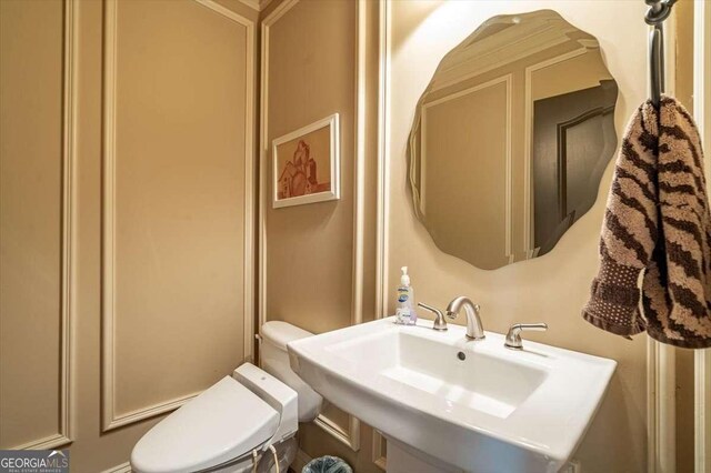 1786 Cambridge Sq, Watkinsville, GA 30677 - half bathroom with a sink and toilet