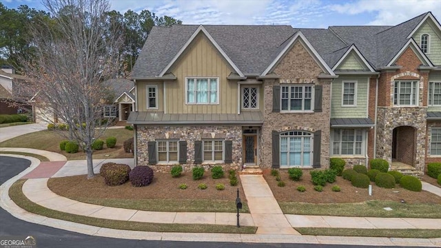 1786 Cambridge Sq, Watkinsville, GA 30677 - view of property with board and batten siding, stone siding, and roof with shingles