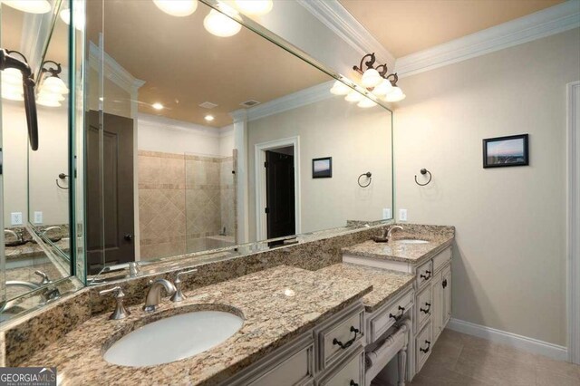 1786 Cambridge Sq, Watkinsville, GA 30677 - full bathroom featuring crown molding, double vanity, and a sink
