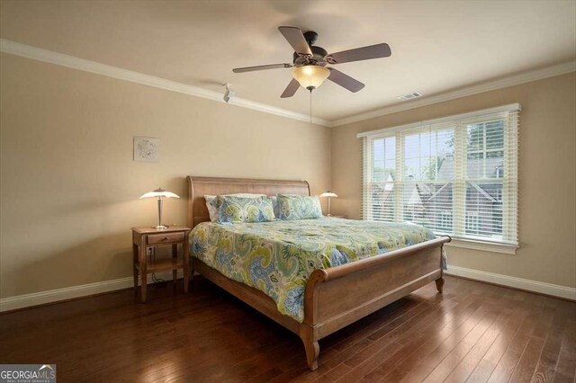1786 Cambridge Sq, Watkinsville, GA 30677 - bedroom with baseboards, crown molding, a ceiling fan, visible vents, and wood-type flooring