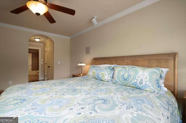 1786 Cambridge Sq, Watkinsville, GA 30677 - bedroom featuring crown molding, ceiling fan, and arched walkways