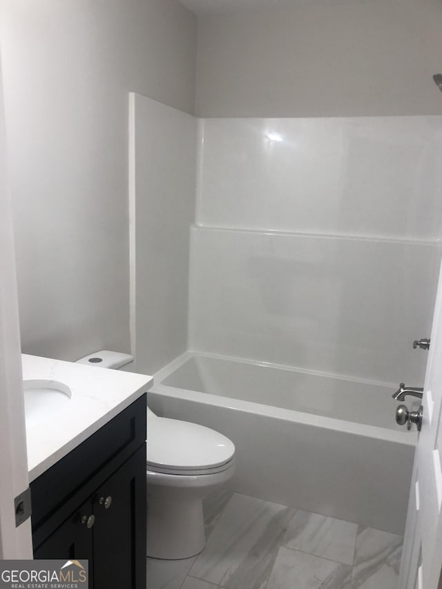 2303 12th Ave, Valley, AL 36854 - full bath featuring shower / tub combination, vanity, marble finish floor, and toilet
