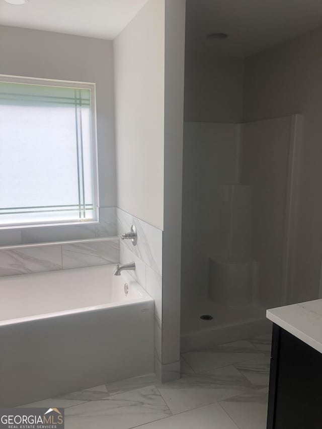 2303 12th Ave, Valley, AL 36854 - bathroom with a shower, vanity, and a garden tub