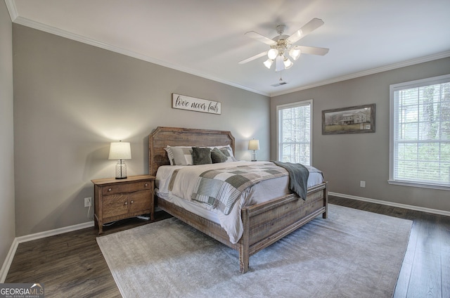 bedroom featuring dark wood-style flooring, multiple windows, baseboards, and visible vents