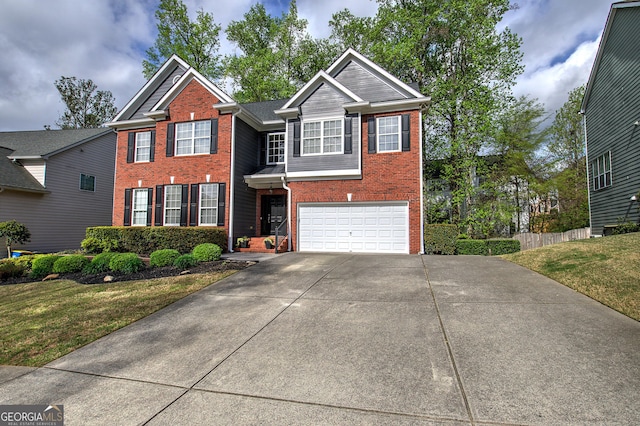 view of front of house featuring a garage, brick siding, driveway, and a front lawn