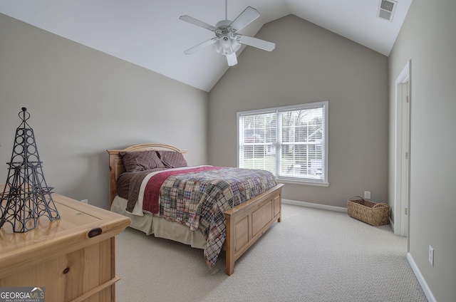 bedroom featuring baseboards, vaulted ceiling, a ceiling fan, visible vents, and light colored carpet