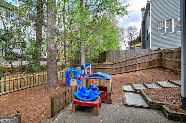 view of playground with fence
