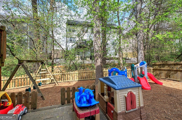 view of play area featuring a fenced backyard