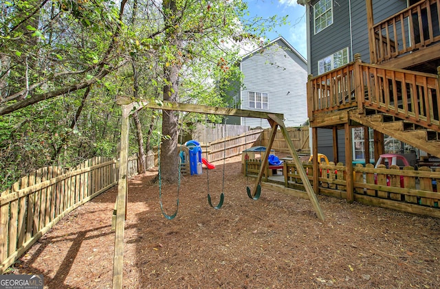 view of playground featuring a fenced backyard