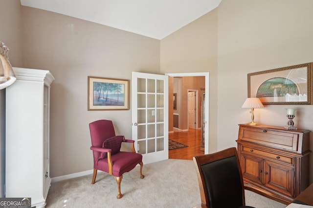 2545 Amberbrook Ln, Grayson, GA 30017 - sitting room with carpet floors, baseboards, and high vaulted ceiling