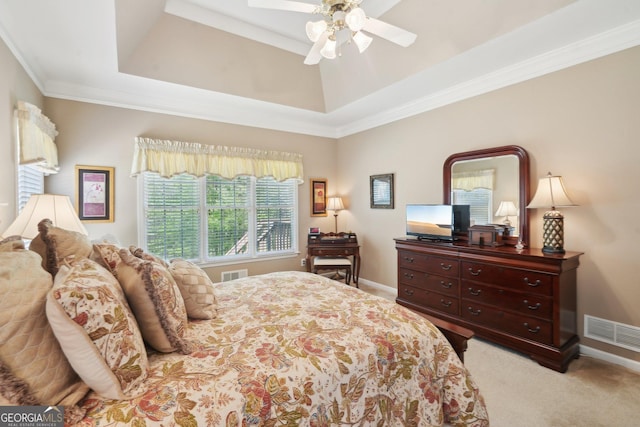2545 Amberbrook Ln, Grayson, GA 30017 - bedroom with light carpet, visible vents, a tray ceiling, and crown molding