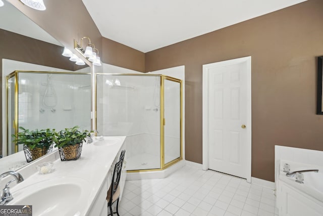 2545 Amberbrook Ln, Grayson, GA 30017 - bathroom featuring a sink, tile patterned floors, a stall shower, and baseboards