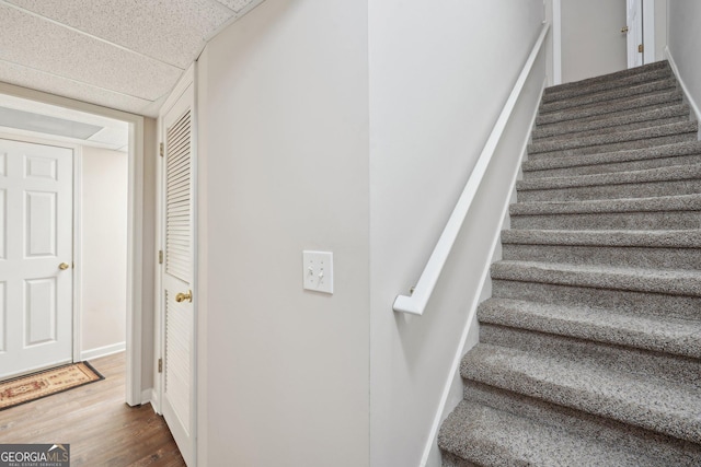 2545 Amberbrook Ln, Grayson, GA 30017 - stairway featuring wood finished floors and baseboards