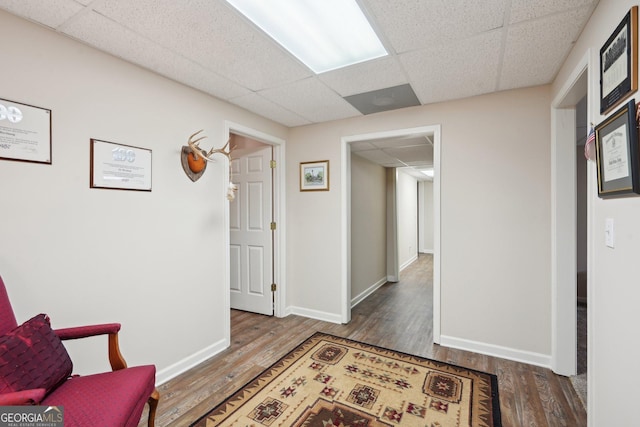 2545 Amberbrook Ln, Grayson, GA 30017 - interior space with a drop ceiling, baseboards, and wood finished floors
