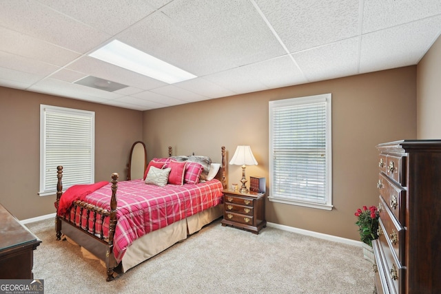2545 Amberbrook Ln, Grayson, GA 30017 - carpeted bedroom with a paneled ceiling and baseboards
