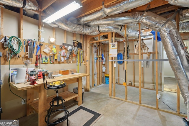 2545 Amberbrook Ln, Grayson, GA 30017 - unfinished below grade area with a workshop area