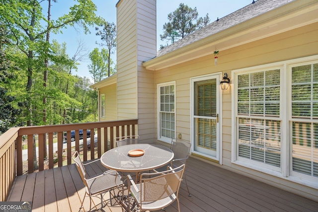 2545 Amberbrook Ln, Grayson, GA 30017 - wooden deck featuring outdoor dining space