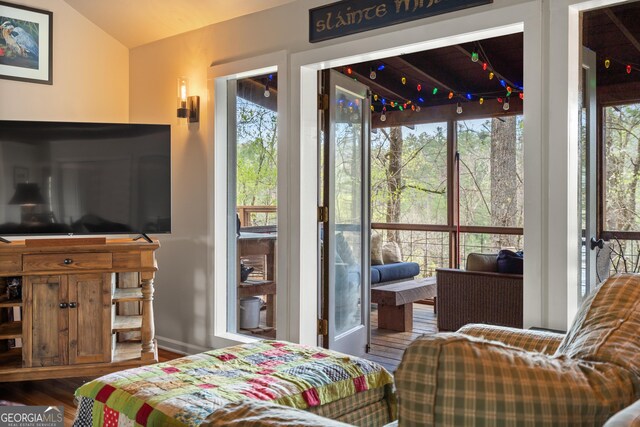 426 Crow Creek Rd, Lakemont, GA 30552 - bedroom with vaulted ceiling and wood finished floors