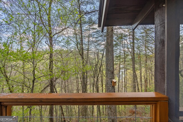 426 Crow Creek Rd, Lakemont, GA 30552 - wooden deck with a forest view